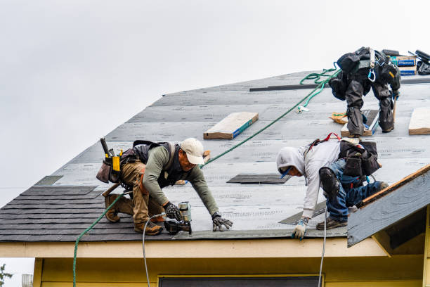 Professional Gutter Installation technician working in Petoskey, MI